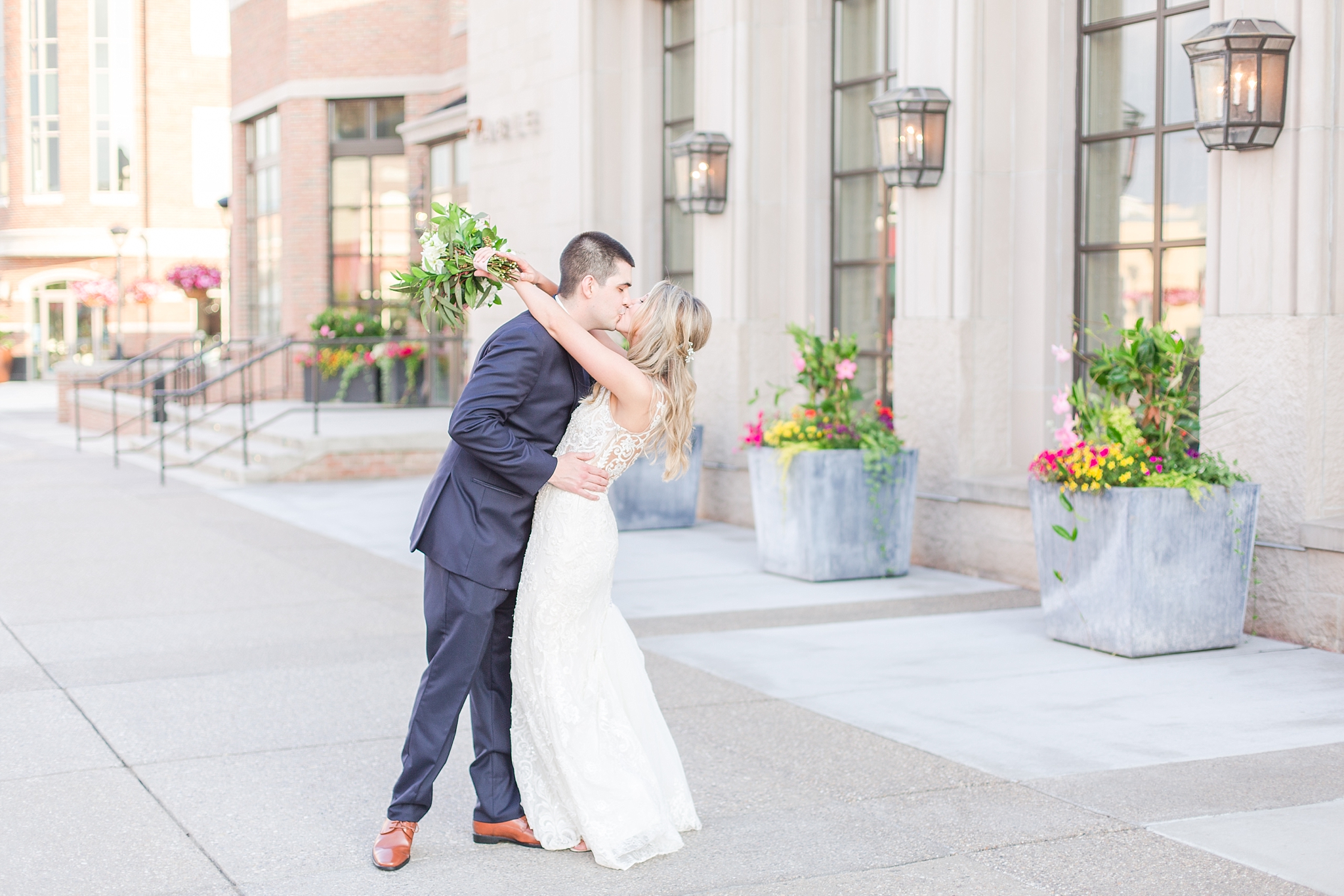 candid-romantic-wedding-photos-at-the-h-hotel-in-midland-michigan-by-courtney-carolyn-photography_0100.jpg