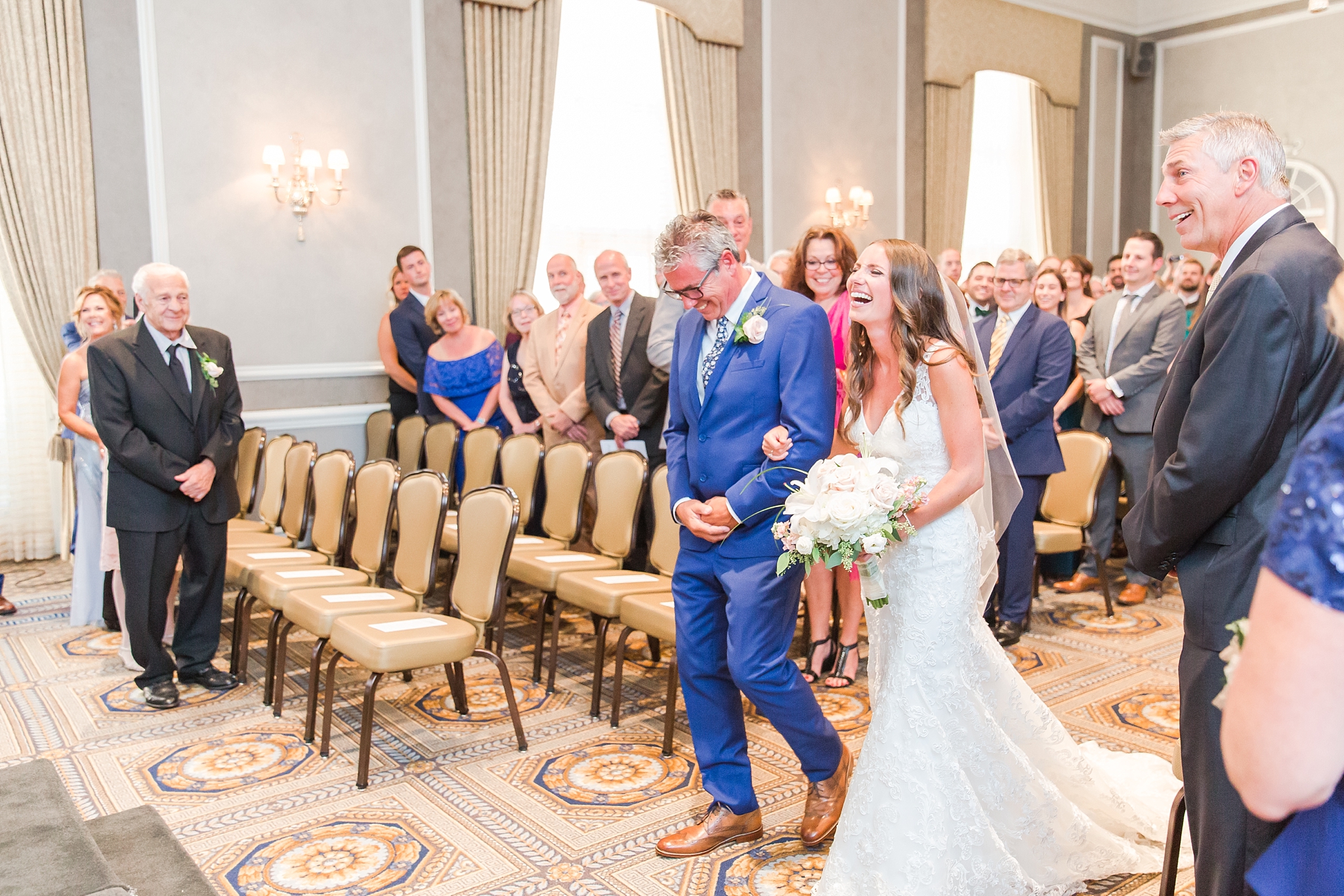 playful-blush-navy-wedding-photos-the-detroit-athletic-club-in-detroit-michigan-by-courtney-carolyn-photography_0026.jpg