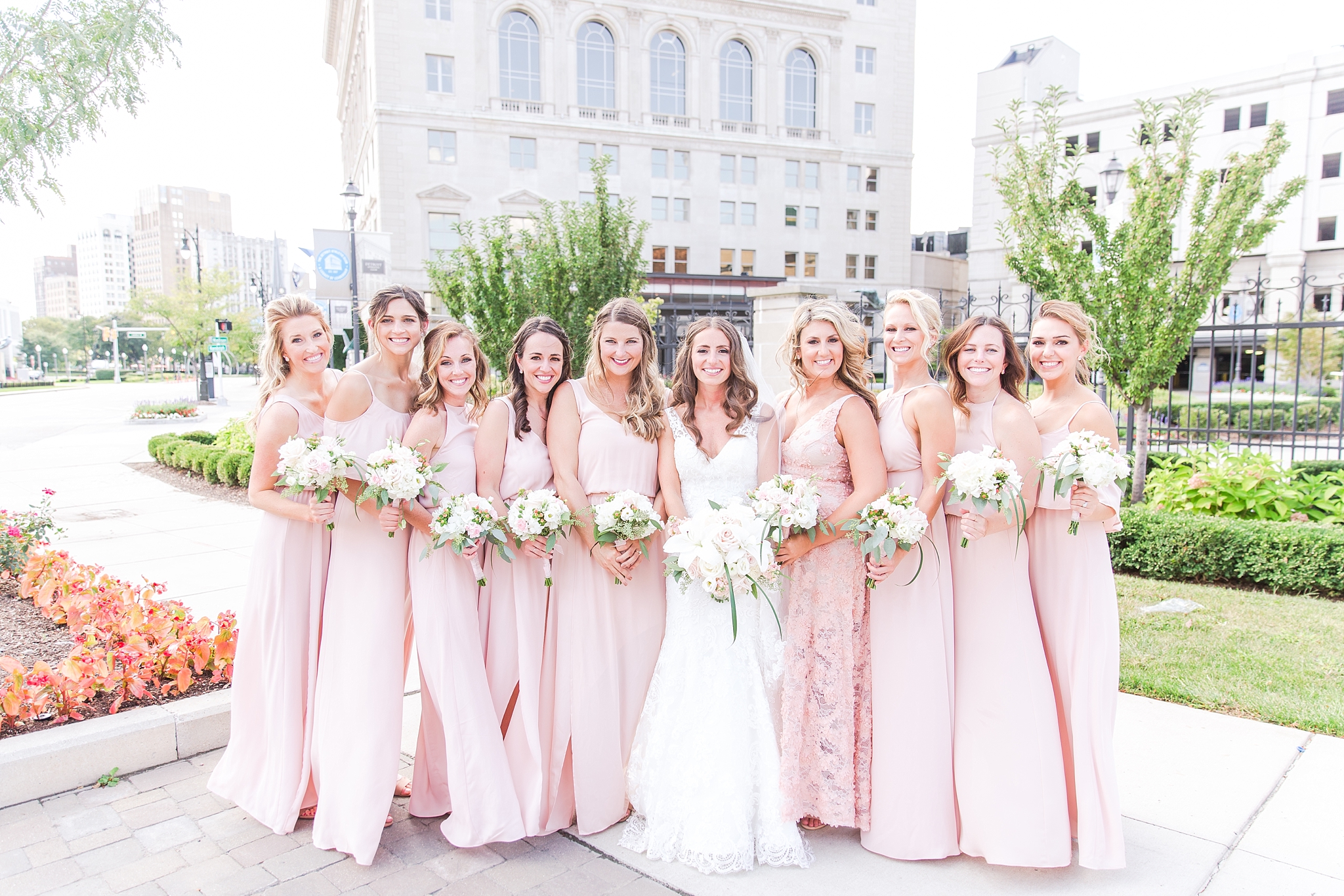 playful-blush-navy-wedding-photos-the-detroit-athletic-club-in-detroit-michigan-by-courtney-carolyn-photography_0047.jpg