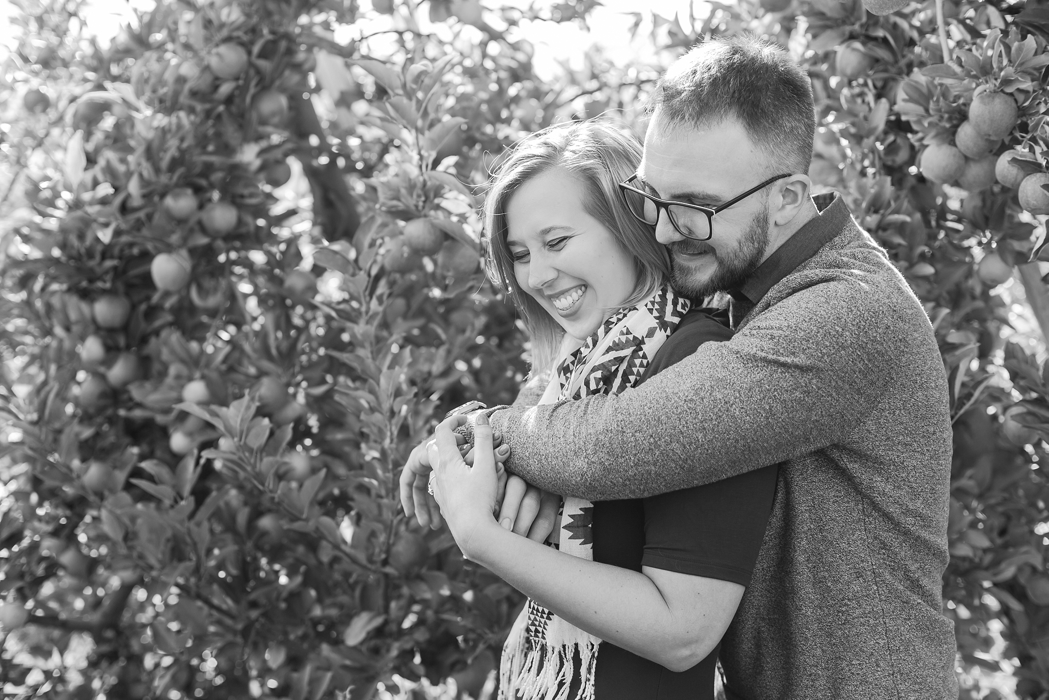 playful-fall-engagement-photos-at-hy's-cider-mill-ochard-in-bruce-township-michigan-by-courtney-carolyn-photography_0008.jpg