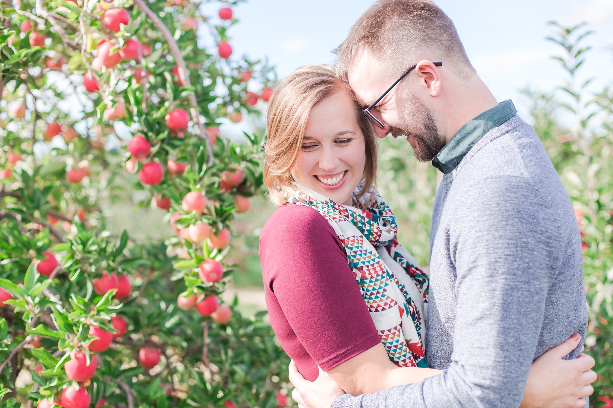 playful-fall-engagement-photos-at-hy's-cider-mill-ochard-in-bruce-township-michigan-by-courtney-carolyn-photography_0014.jpg