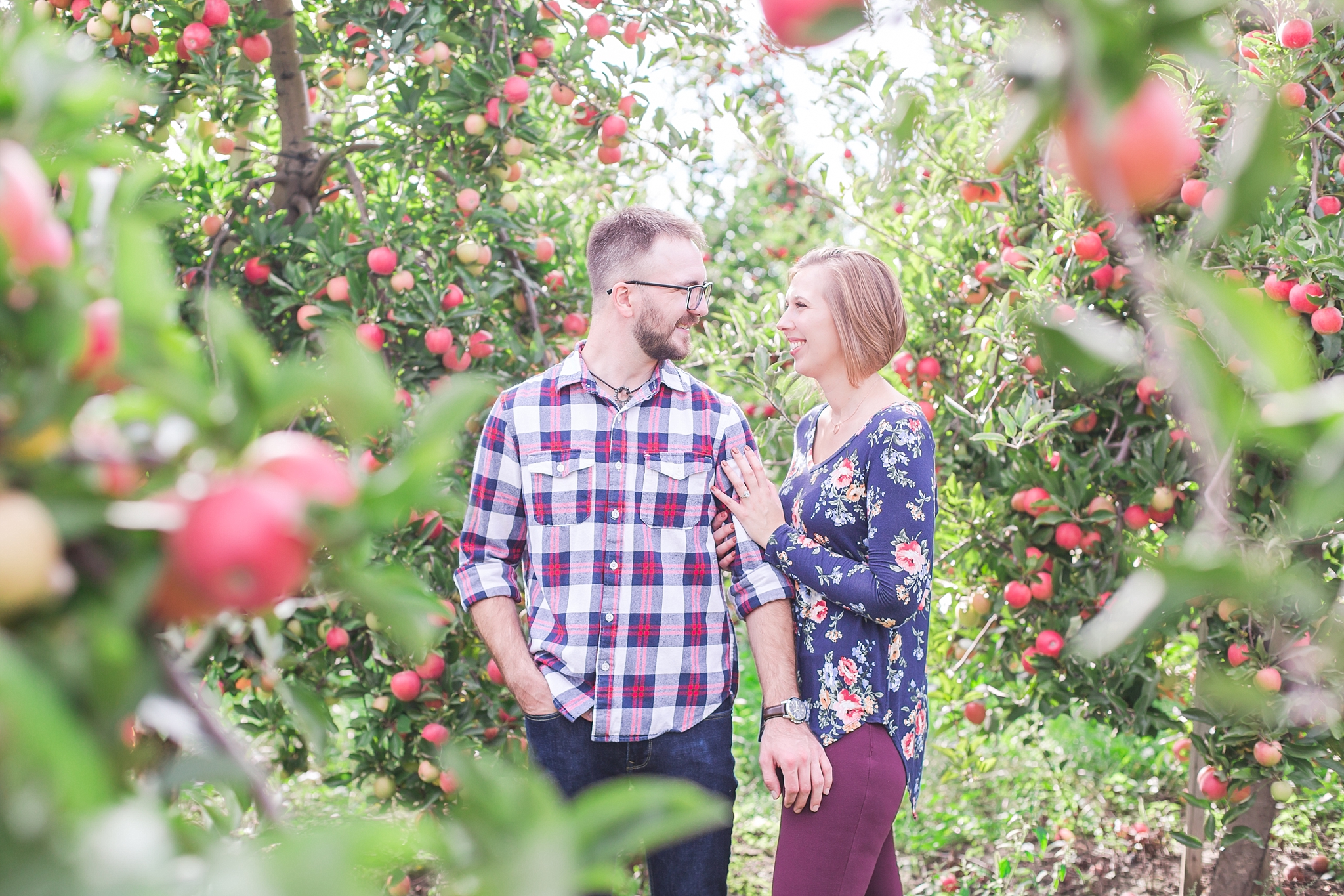 playful-fall-engagement-photos-at-hy's-cider-mill-ochard-in-bruce-township-michigan-by-courtney-carolyn-photography_0022.jpg