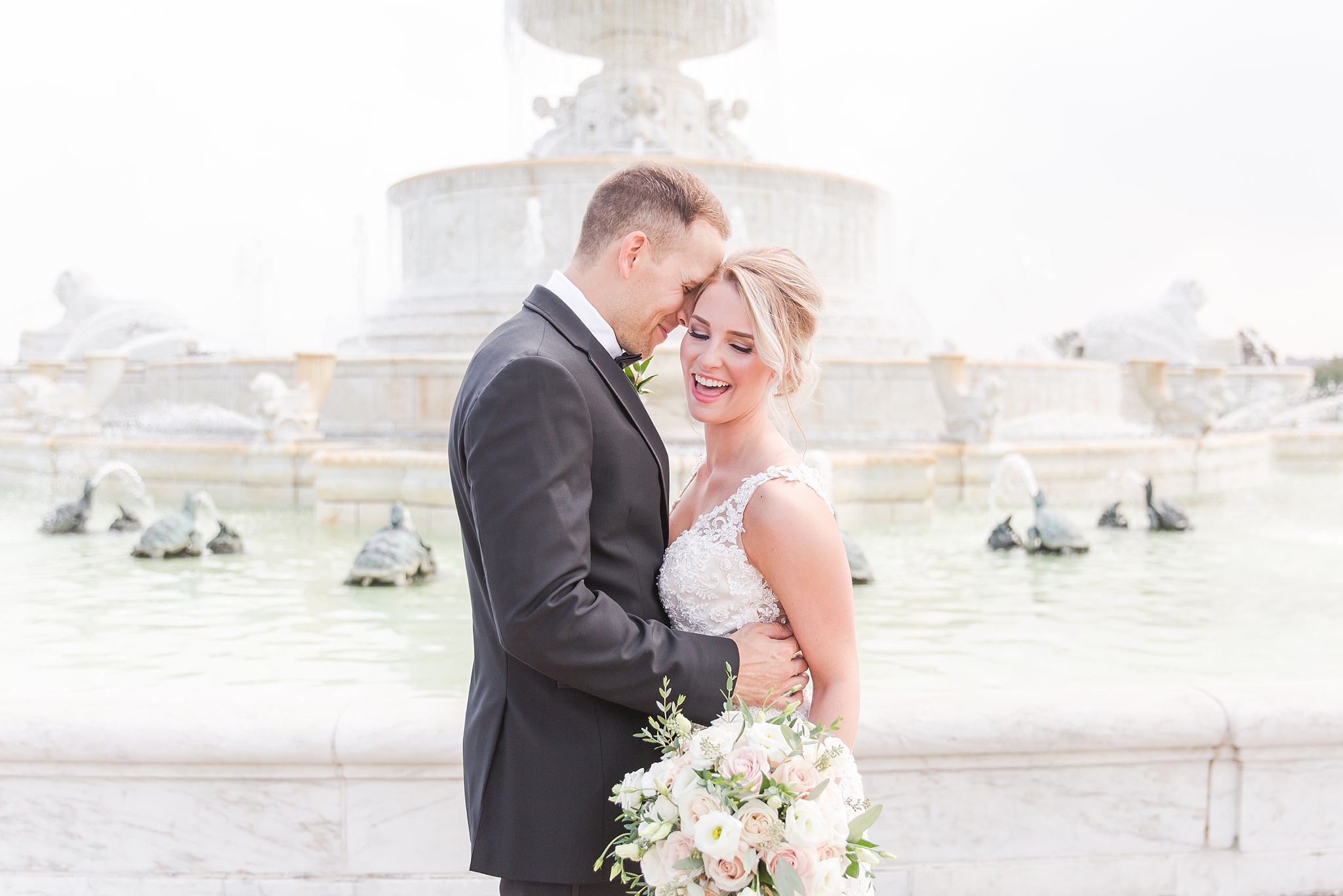 candid-romantic-wedding-photos-at-the-masonic-temple-belle-isle-detroit-institute-of-arts-in-detroit-michigan-by-courtney-carolyn-photography_0049.jpg