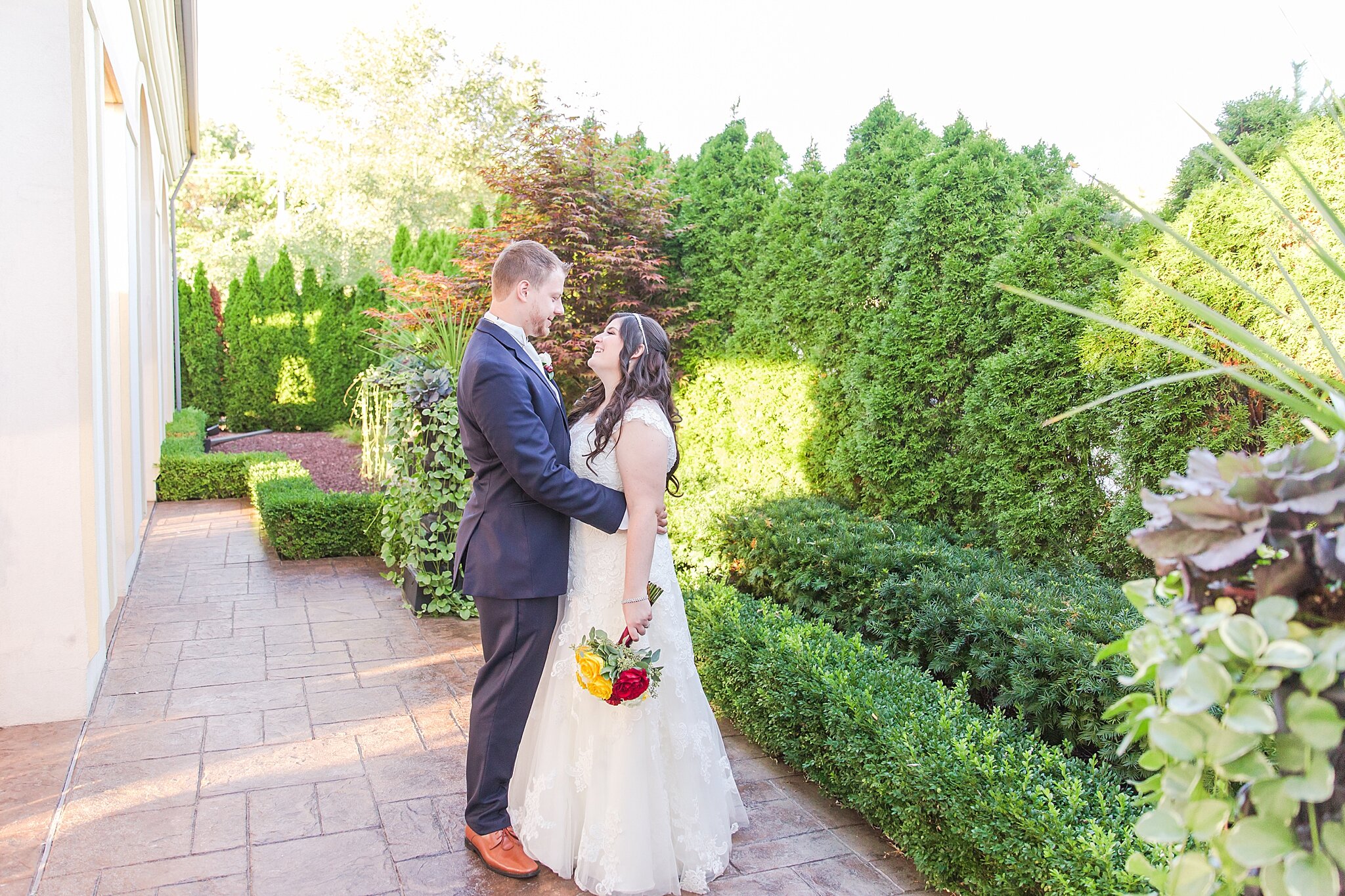 detroit-wedding-photographer-open-air-chapel-crystal-gardens-howell-kim-mark-by-courtney-carolyn-photography_0083.jpg