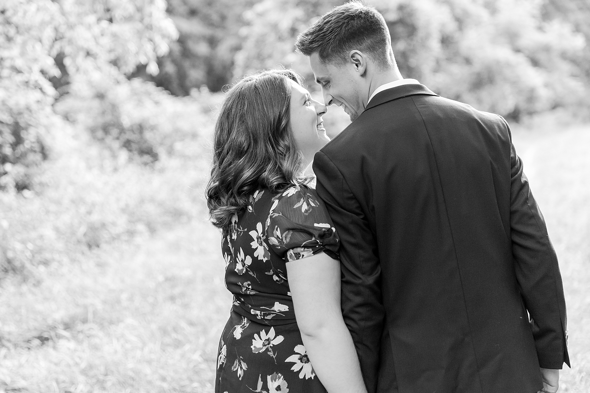 detroit-wedding-photographer-candid-engagement-photos-at-stony-creek-metropark-jackie-kyle-by-courtney-carolyn-photography_0004.jpg