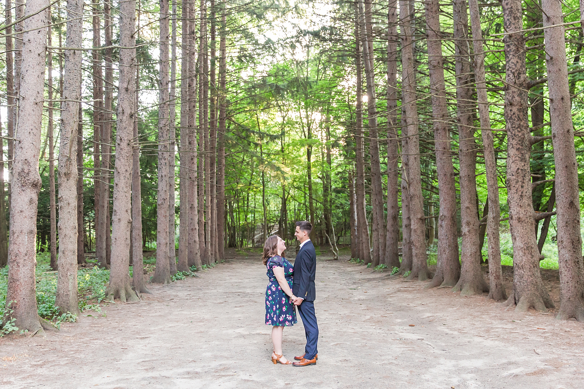 detroit-wedding-photographer-candid-engagement-photos-at-stony-creek-metropark-jackie-kyle-by-courtney-carolyn-photography_0016.jpg