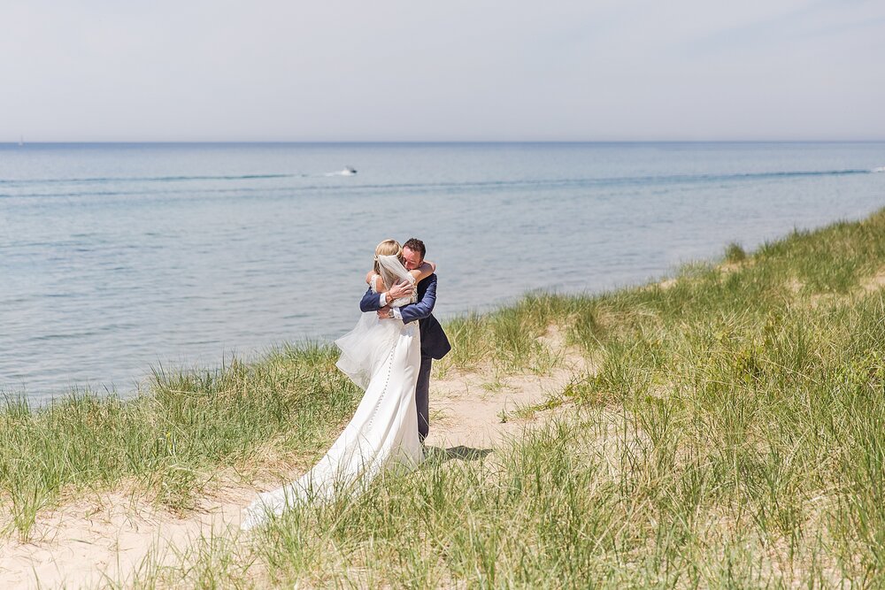 detroit-wedding-photographer-destination-beach-wedding-photos-at-boatwerks-in-holland-mi-by-courtney-carolyn-photography_0023.jpg