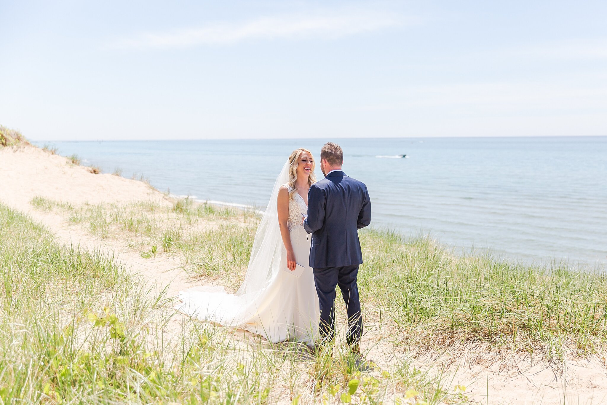 detroit-wedding-photographer-destination-beach-wedding-photos-at-boatwerks-in-holland-mi-by-courtney-carolyn-photography_0027.jpg