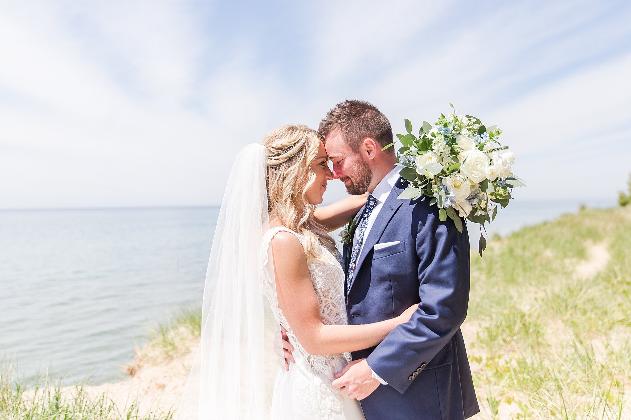 detroit-wedding-photographer-destination-beach-wedding-photos-at-boatwerks-in-holland-mi-by-courtney-carolyn-photography_0029.jpg