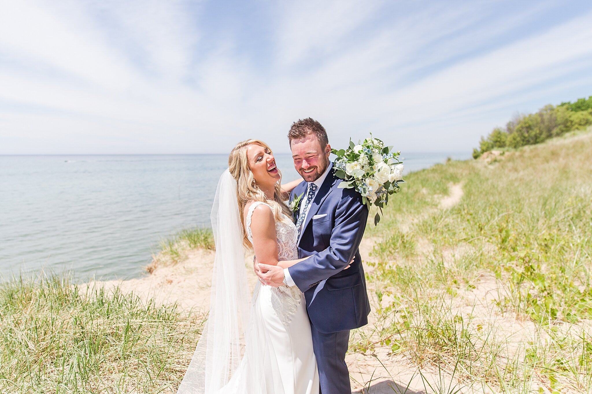 detroit-wedding-photographer-destination-beach-wedding-photos-at-boatwerks-in-holland-mi-by-courtney-carolyn-photography_0035.jpg