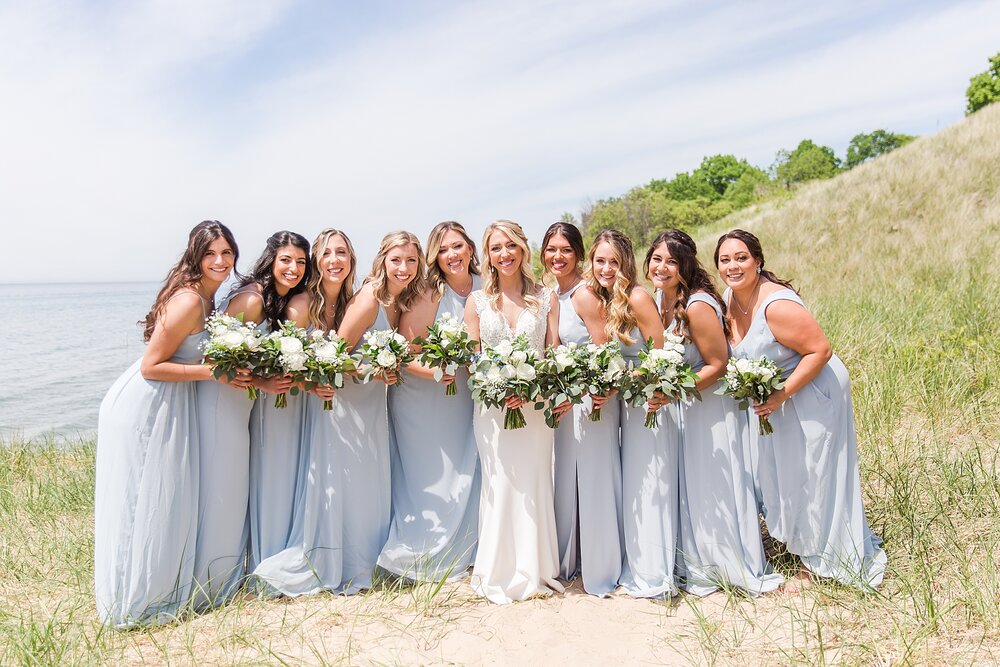 detroit-wedding-photographer-destination-beach-wedding-photos-at-boatwerks-in-holland-mi-by-courtney-carolyn-photography_0037.jpg