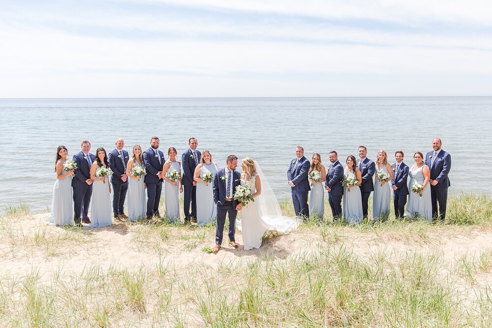 detroit-wedding-photographer-destination-beach-wedding-photos-at-boatwerks-in-holland-mi-by-courtney-carolyn-photography_0039.jpg