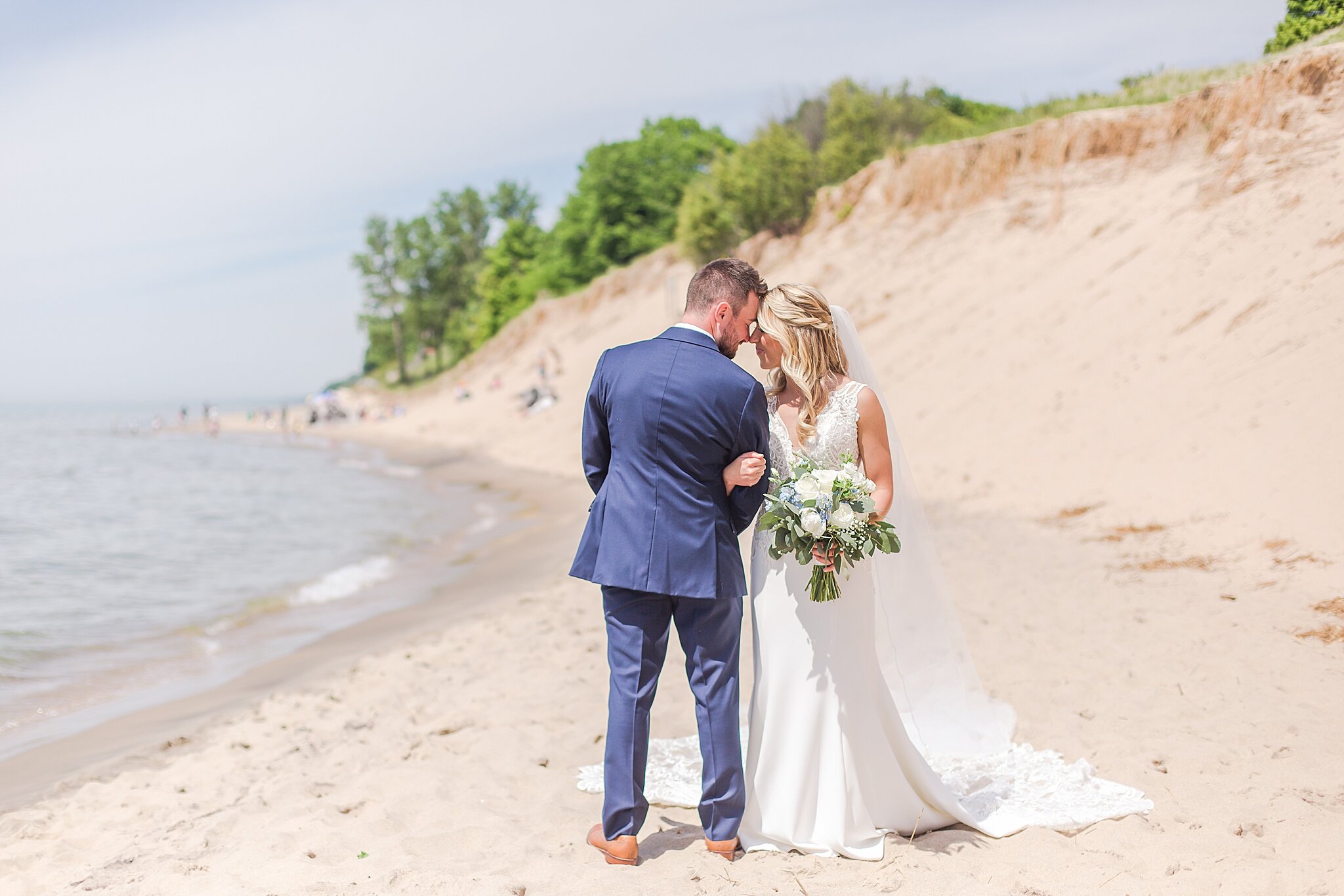 detroit-wedding-photographer-destination-beach-wedding-photos-at-boatwerks-in-holland-mi-by-courtney-carolyn-photography_0045.jpg