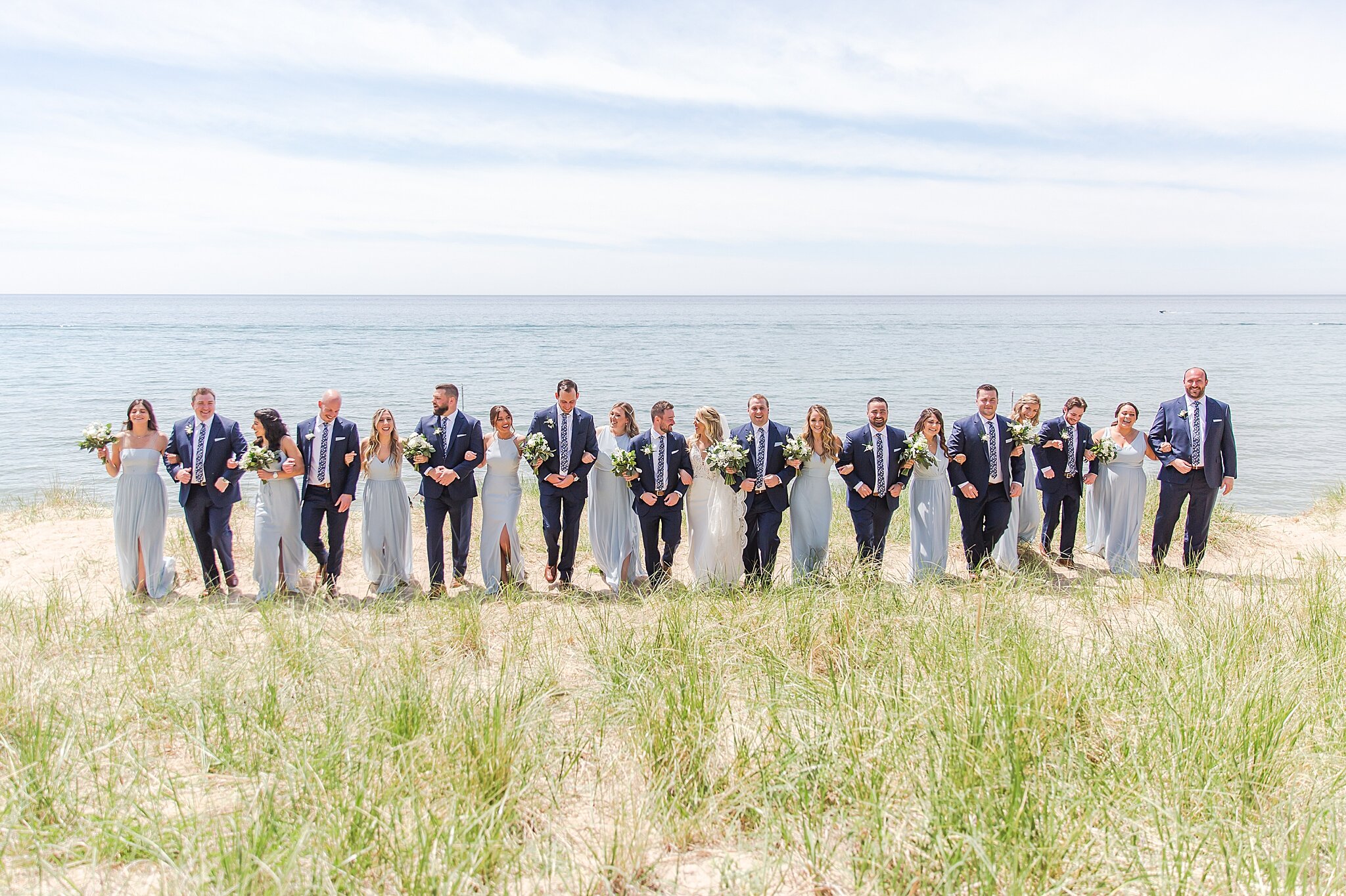 detroit-wedding-photographer-destination-beach-wedding-photos-at-boatwerks-in-holland-mi-by-courtney-carolyn-photography_0053.jpg