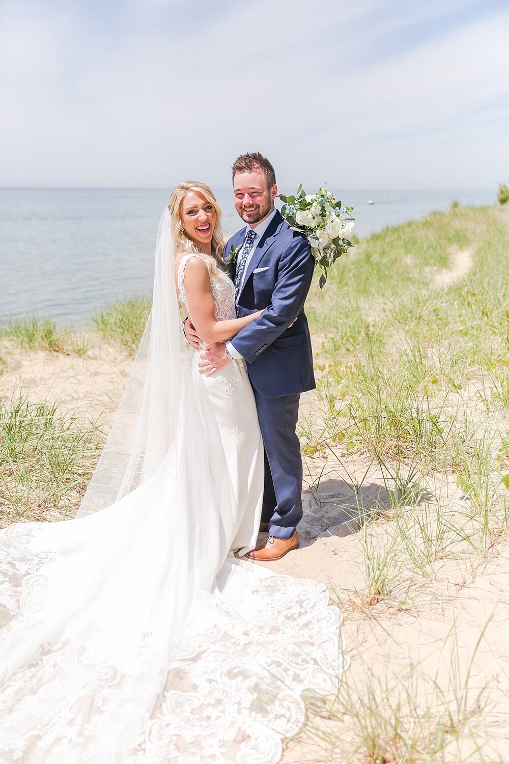 detroit-wedding-photographer-destination-beach-wedding-photos-at-boatwerks-in-holland-mi-by-courtney-carolyn-photography_0054.jpg