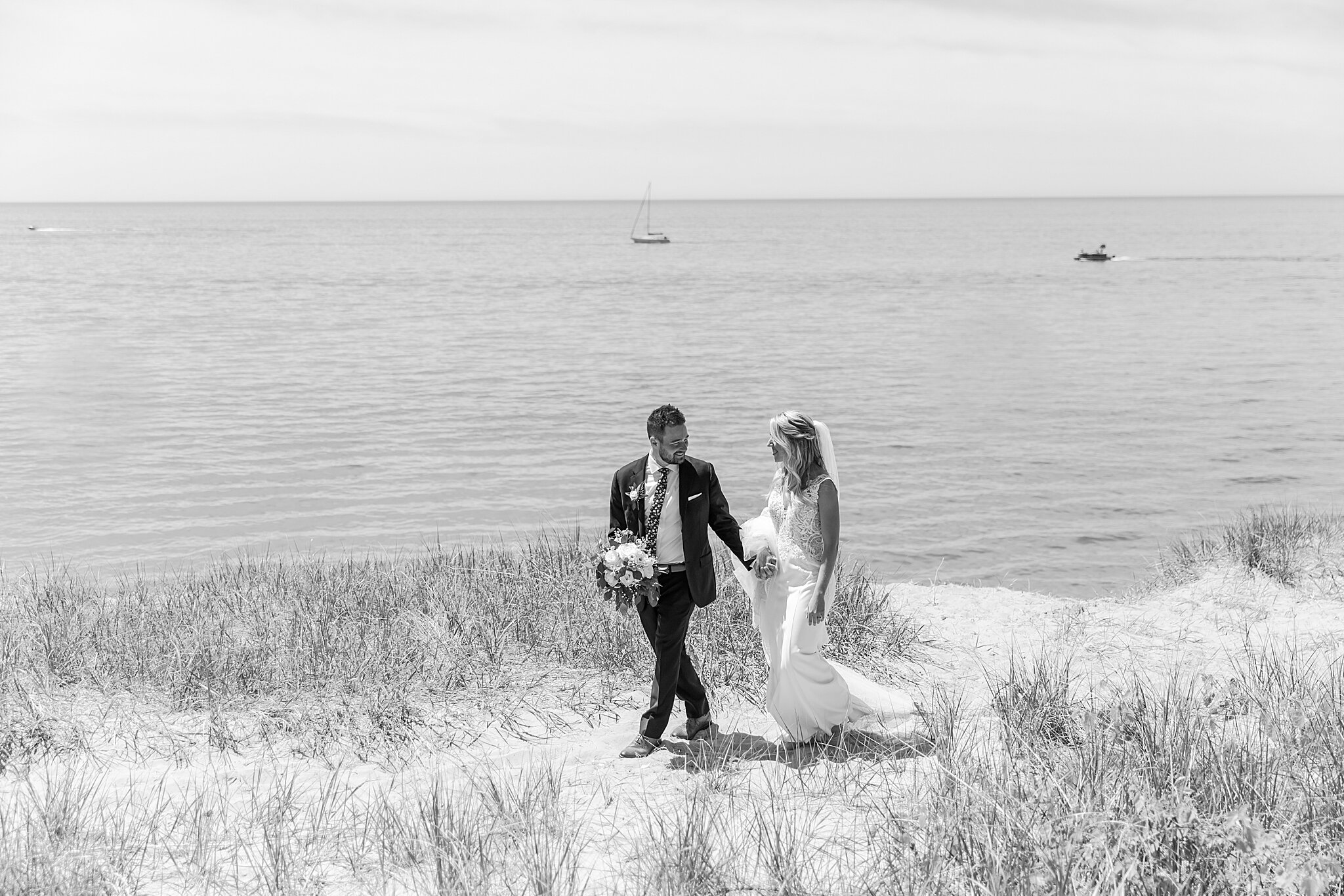 detroit-wedding-photographer-destination-beach-wedding-photos-at-boatwerks-in-holland-mi-by-courtney-carolyn-photography_0055.jpg