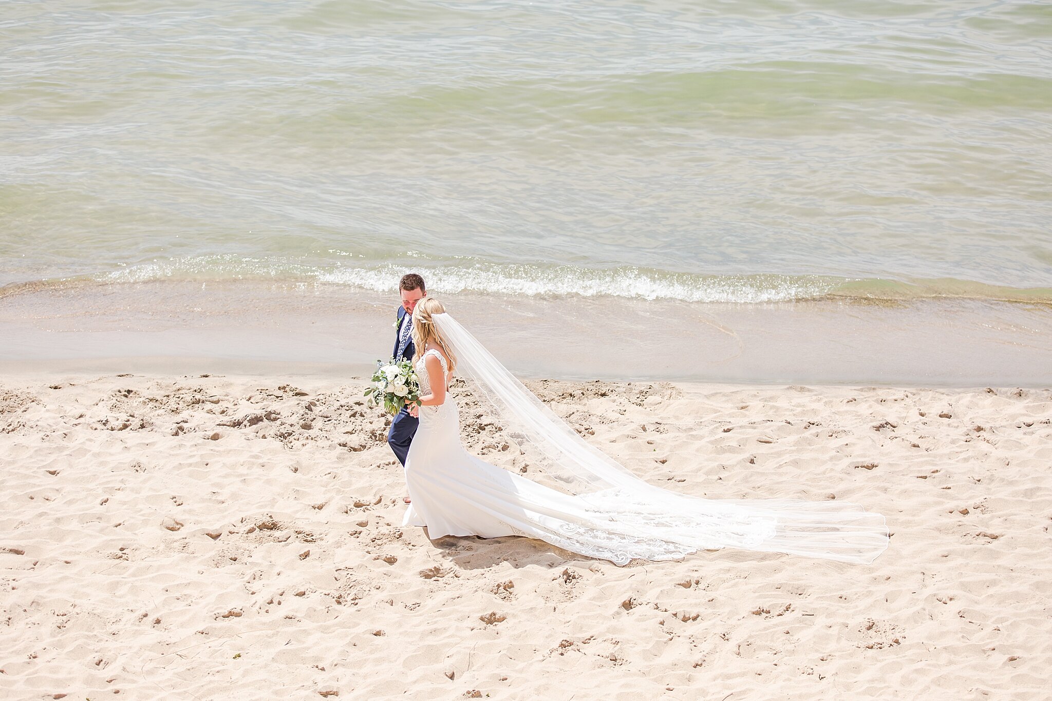 detroit-wedding-photographer-destination-beach-wedding-photos-at-boatwerks-in-holland-mi-by-courtney-carolyn-photography_0059.jpg