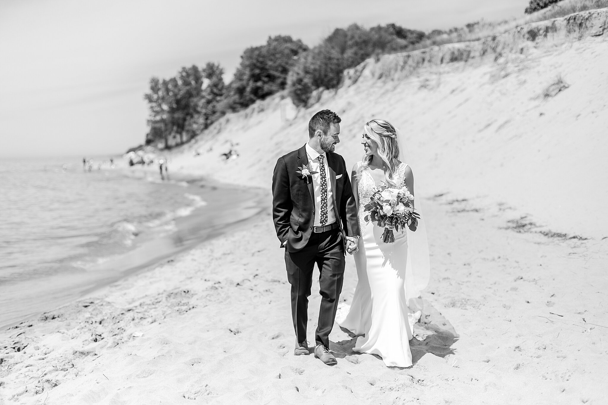 detroit-wedding-photographer-destination-beach-wedding-photos-at-boatwerks-in-holland-mi-by-courtney-carolyn-photography_0061.jpg