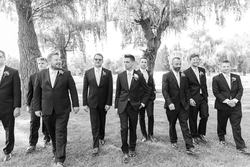 detroit-wedding-photographer-joyful-wedding-photos-at-oak-pointe-country-club-in-brighton-mi-by-courtney-carolyn-photography_0039.jpg