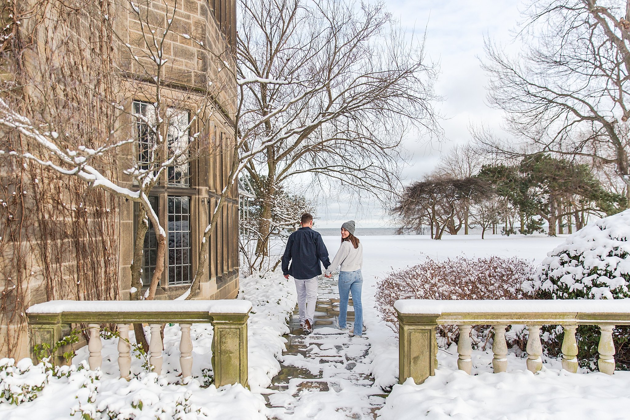 detroit-wedding-photographer-winter-engagement-photos-at-edsel-and-eleanor-ford-house-in-grosse-pointe-mi-by-courtney-carolyn-photography_0022.jpg