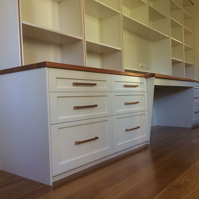 Just completed this office furniture , love these copper handles with the Sydney blue gum. #nsjoinery #melbourne#Sydneyblue gum#craftsman#officecabinets