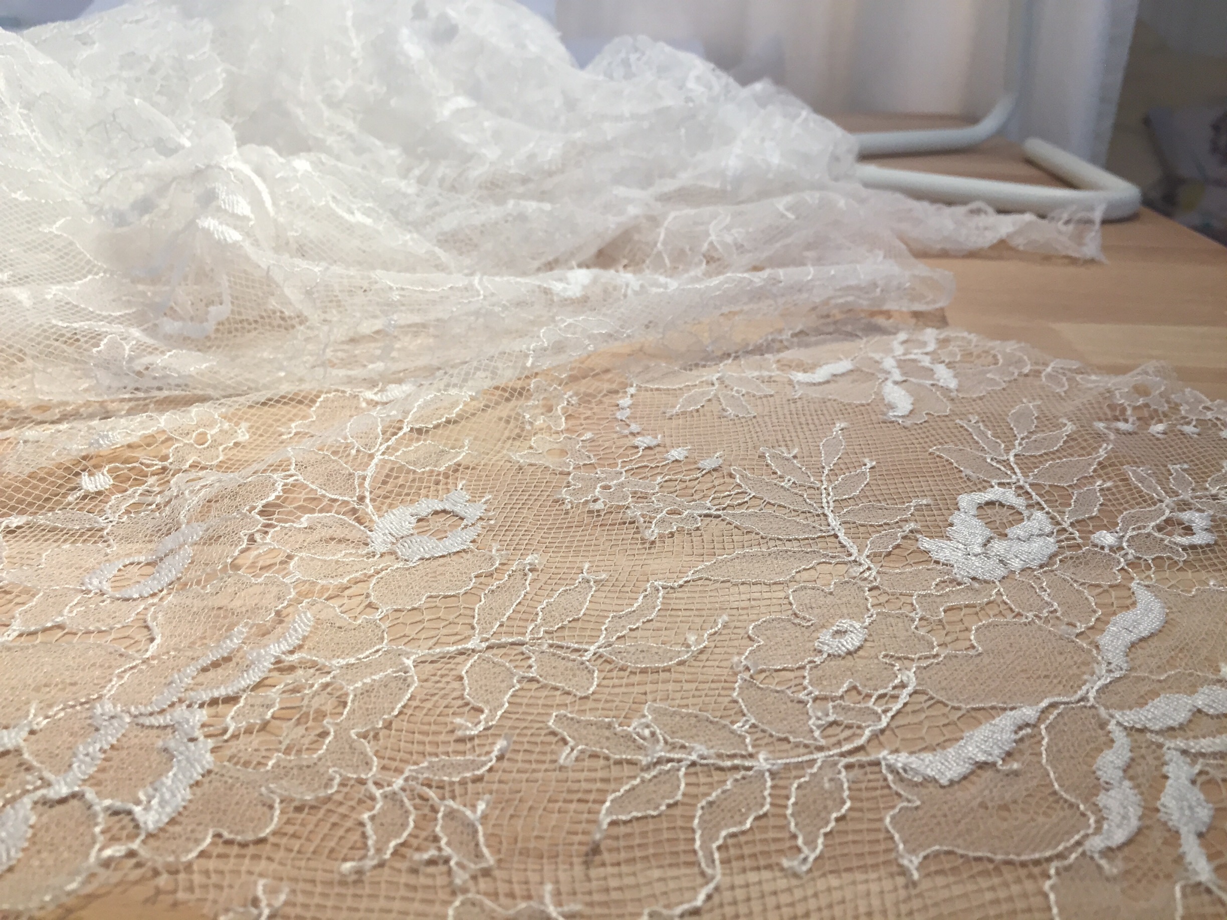 Chantilly lace: This is also a traditionally handmade lace from Chantilly, France, dating back to the 17th century, and is known for its fine, spidery style on a fine ground mesh. The motifs commonly found in chantilly lace are floral, baskets, and vases, and rather than being outlined by cording as seen in the alençon lace from yesterday, these motifs are outlined in a flat untwisted thread. Its quite soft and delicate. I love seeing it on a softly draped bodice but is also used all over dresses, usually blocked over a more sturdy fabric underneath. Historically, this kind of lace was made with black silk threads, and was considered mourning wear. 
