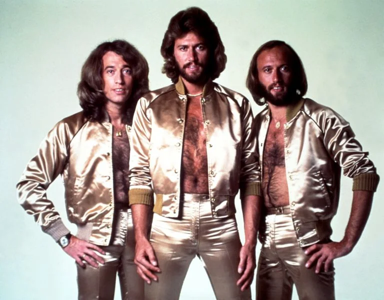 Who doesn't love a gold lamé outfit? Shirts optional. 