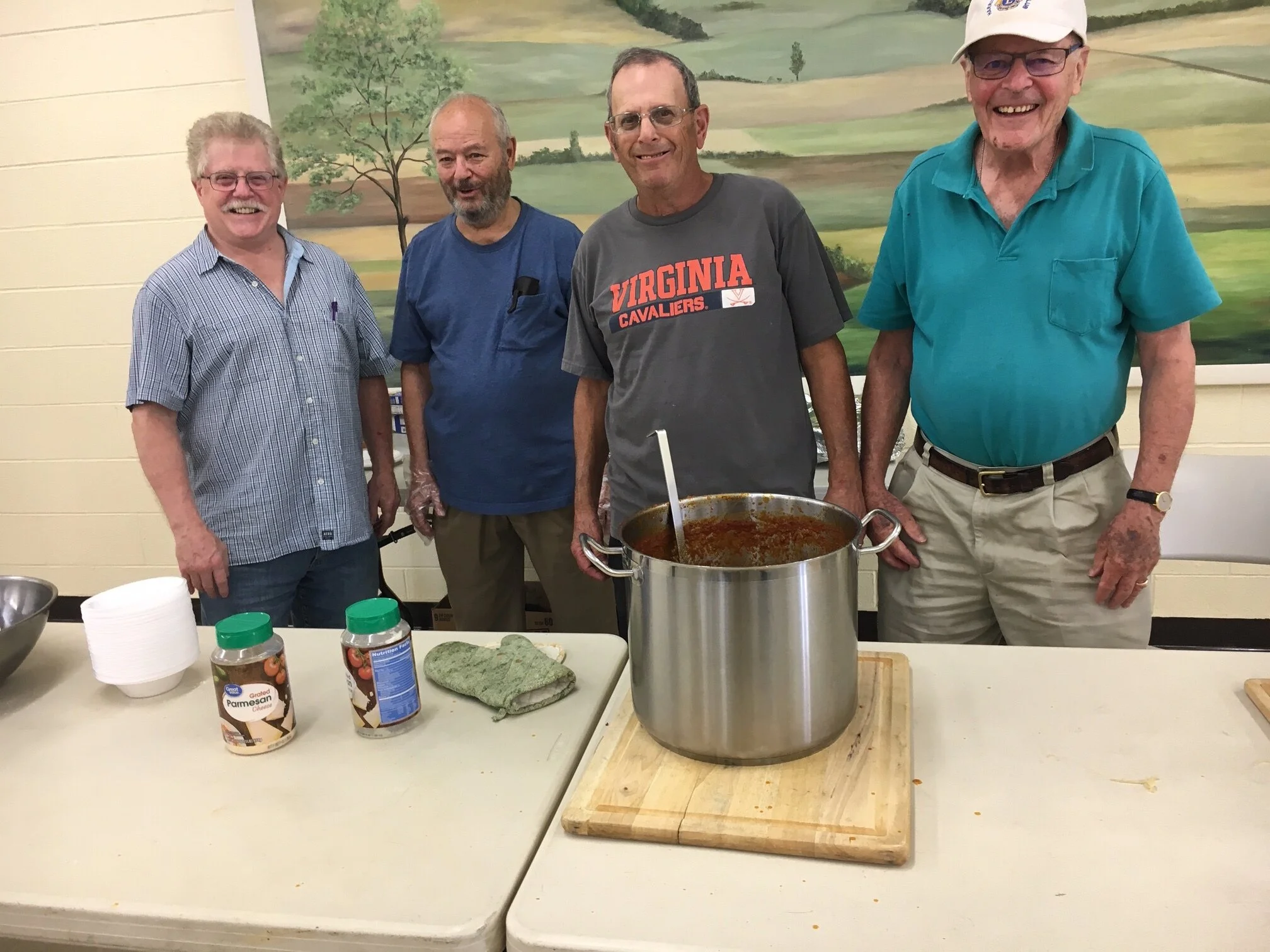  members of the men's club serving lunch for the less fortunate at Blessed Sacrament (the Catholic church in Harrisonburg) on 9.12.19 