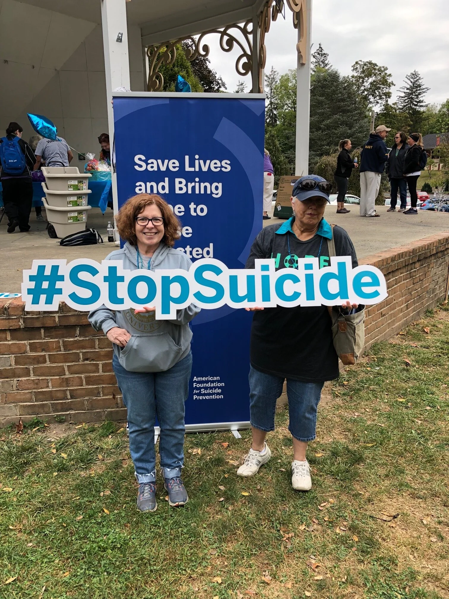 Becky Mintzer and Michelle Ornstein represent Beth El at a local event concerned with preventing suicide.