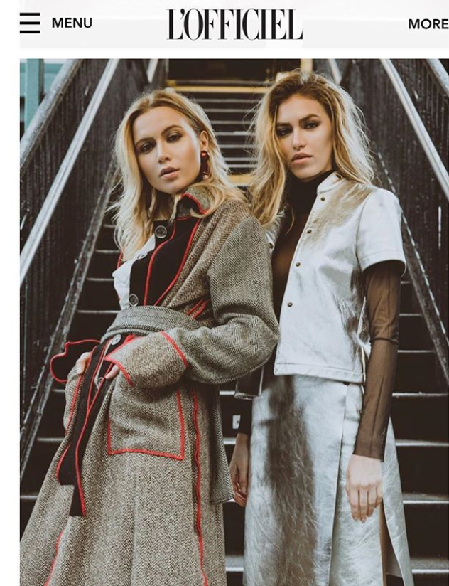 Two models in coat and suit by Marine Penvern, L'Officiel magazine; set in NYC subway station