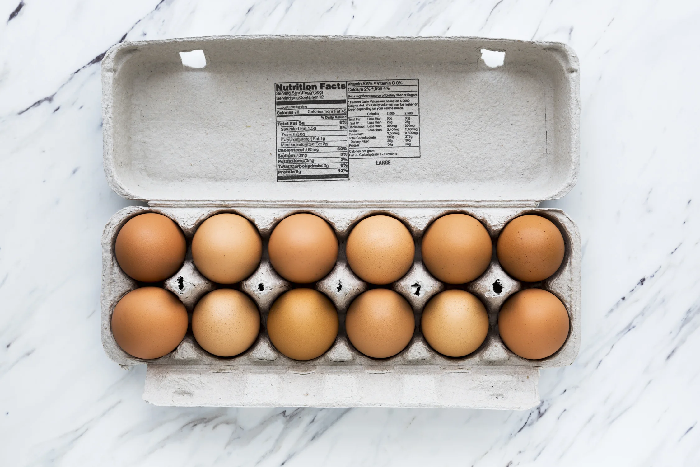 One dozen pasture raised brown eggs with nutrition information