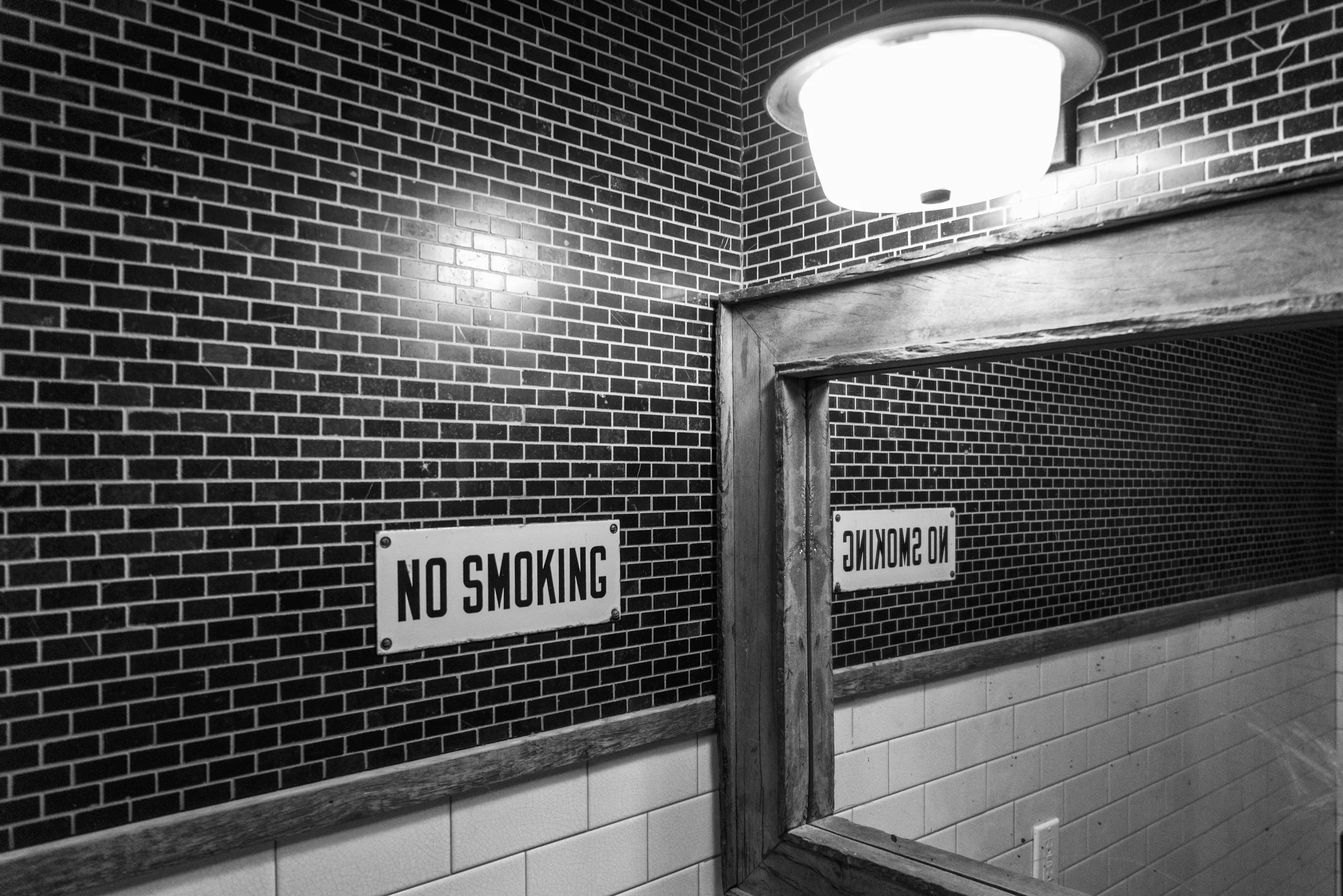 No Smoking sign in a bathroom