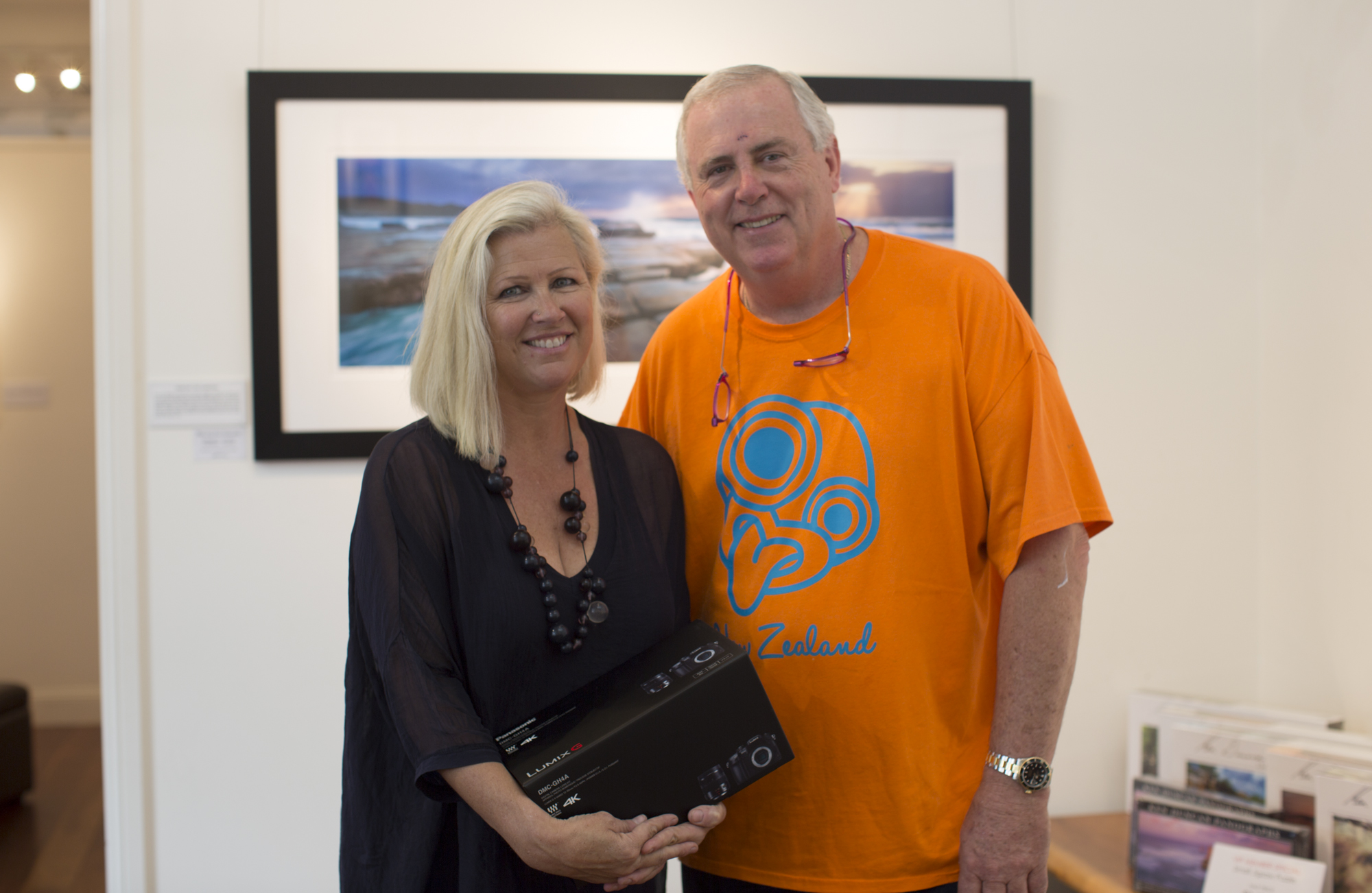 Pam accepting prizes from Ken at his Gallery on the Central Coast