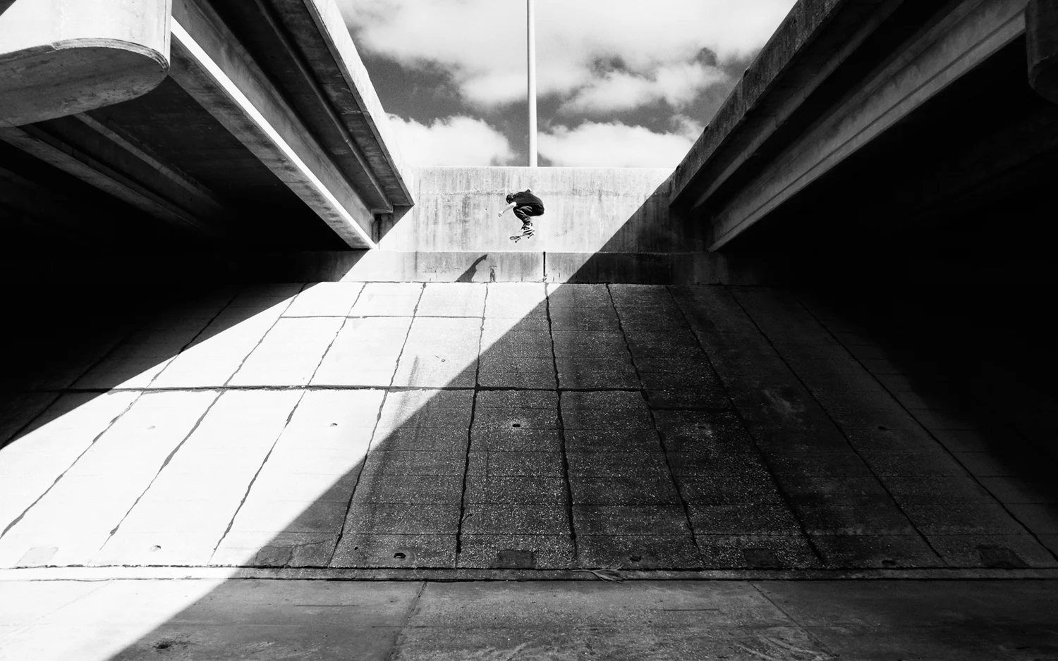 Mitch Pryma, Kickflip. Miami, 2010. From a series of photos made during multiple extensive tours of the Bible Belt and the Mississippi Delta in the Southern United States. The images reveal a stark glimpse into life below the Mason-Dixon line in all it's glory. The entire project was shot on the road in a Keroucian frenzy as seen through the eyes of a rolling bandwagon of skateboarders.