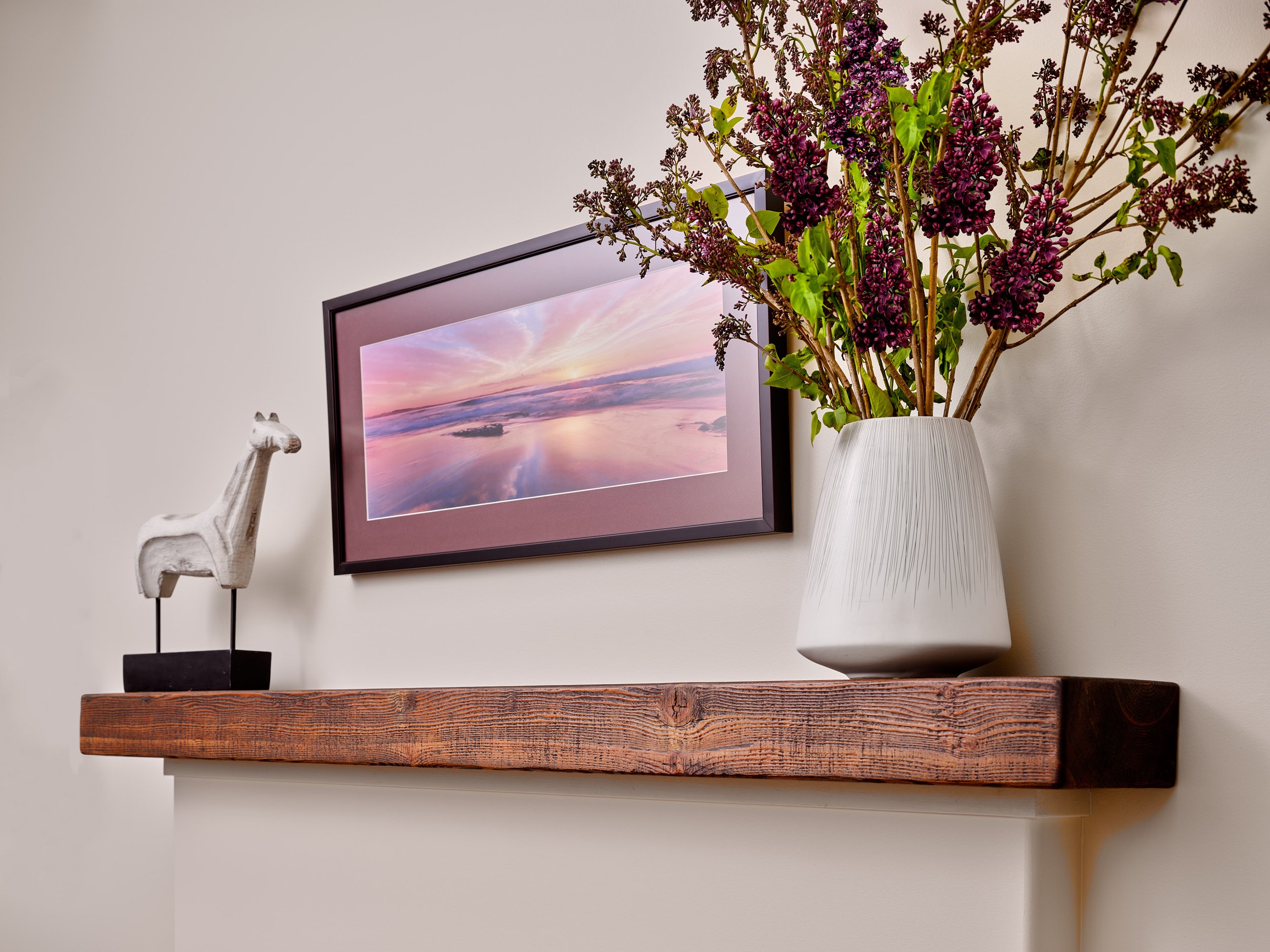 Close-up of the rustic mantle and its beautiful grain.