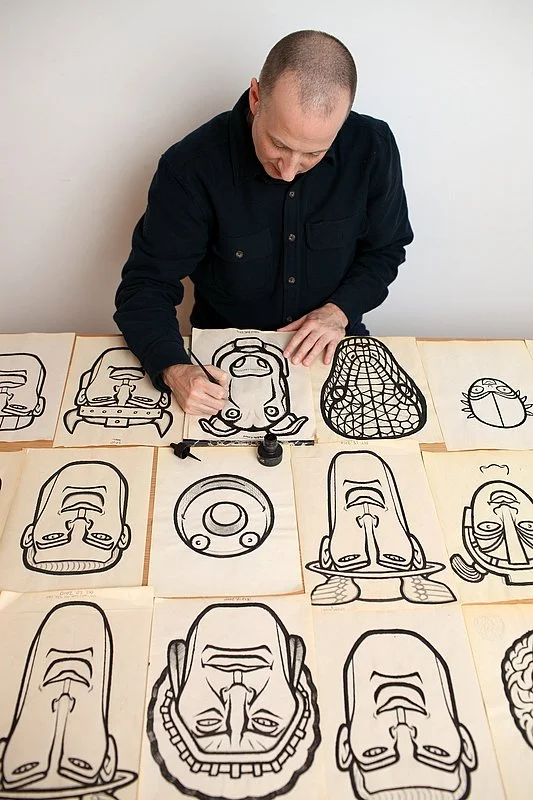 Zak Zych sketching out ideas for the individual elements of the Cartoon Periodic Chart.