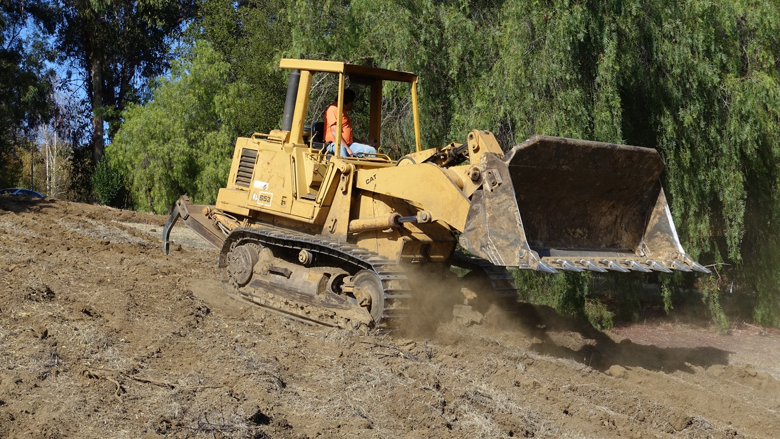 1. Ripping the field 2.5 feet with bulldozer