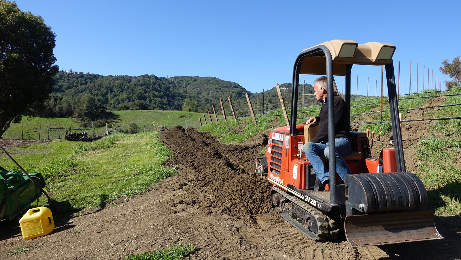 11. Digging irrigation ditches with Ditch Witch