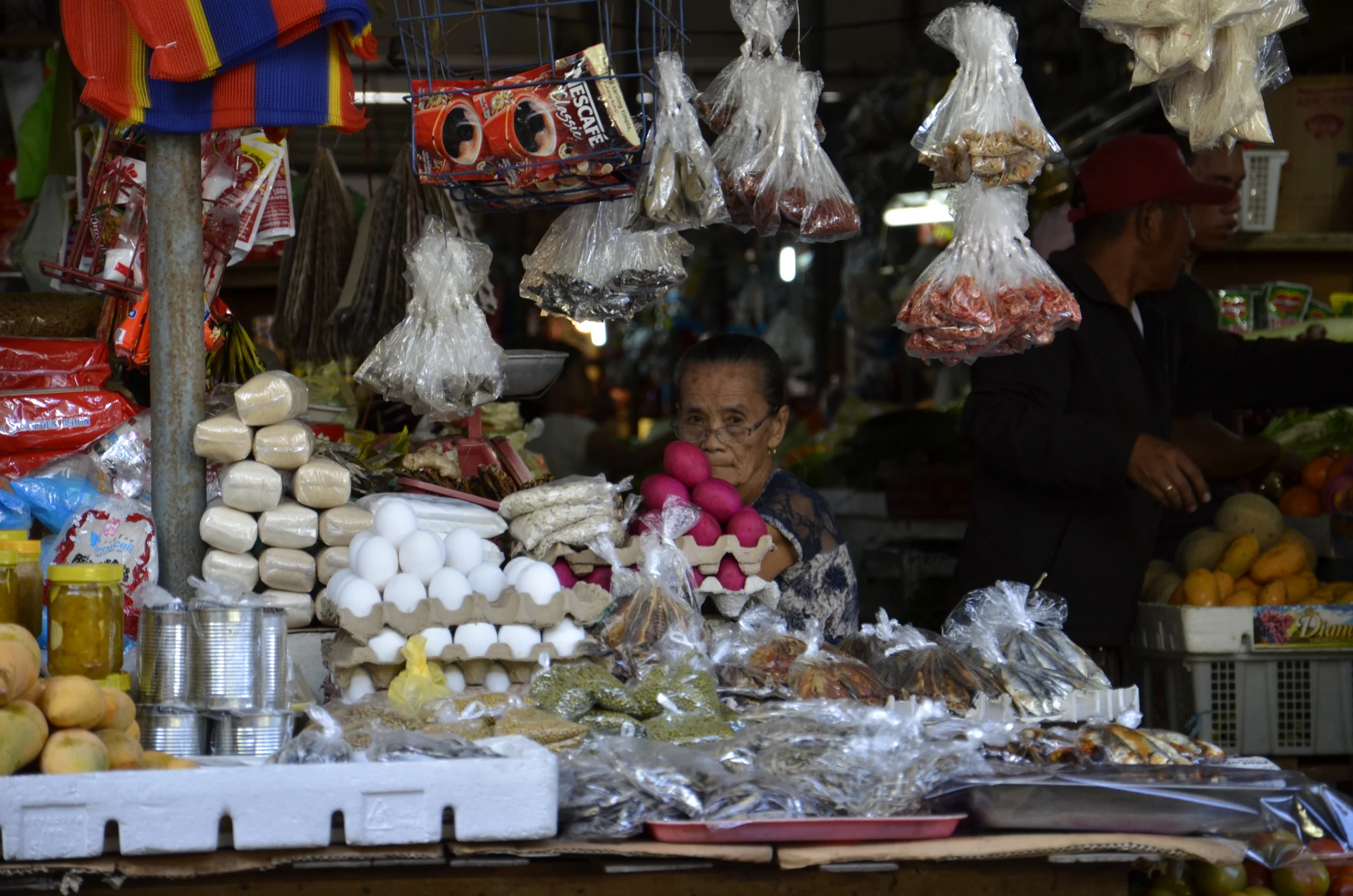  The shop owner watching for customers and thieves in Batangas of the Philippines.  