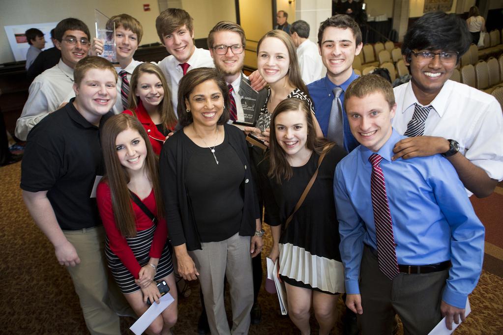 Pittsburgh Dataworks President Saman Haqqi surrounded by a Spring 2015 Pittsburgh Data Jam team. The Pittsburgh Data Jam is one of the signature events of Pittsburgh Dataworks. 