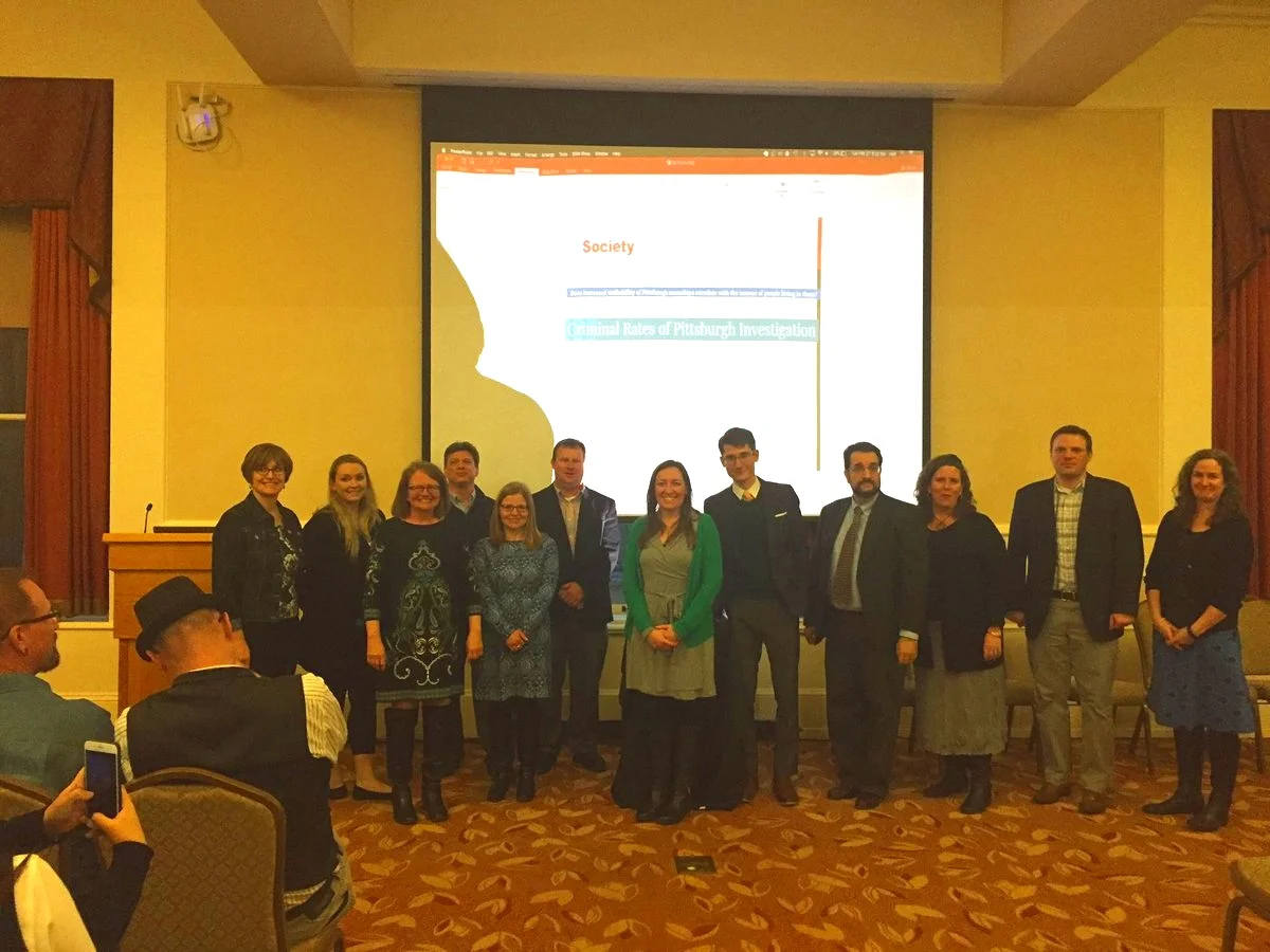 Photo: Students displaying their final poster project during the 2017 Data Jams finale.