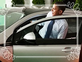 Obama climbs into a Chevy Volt with staged emotion in 2010. The breezy artifice of “progress.”