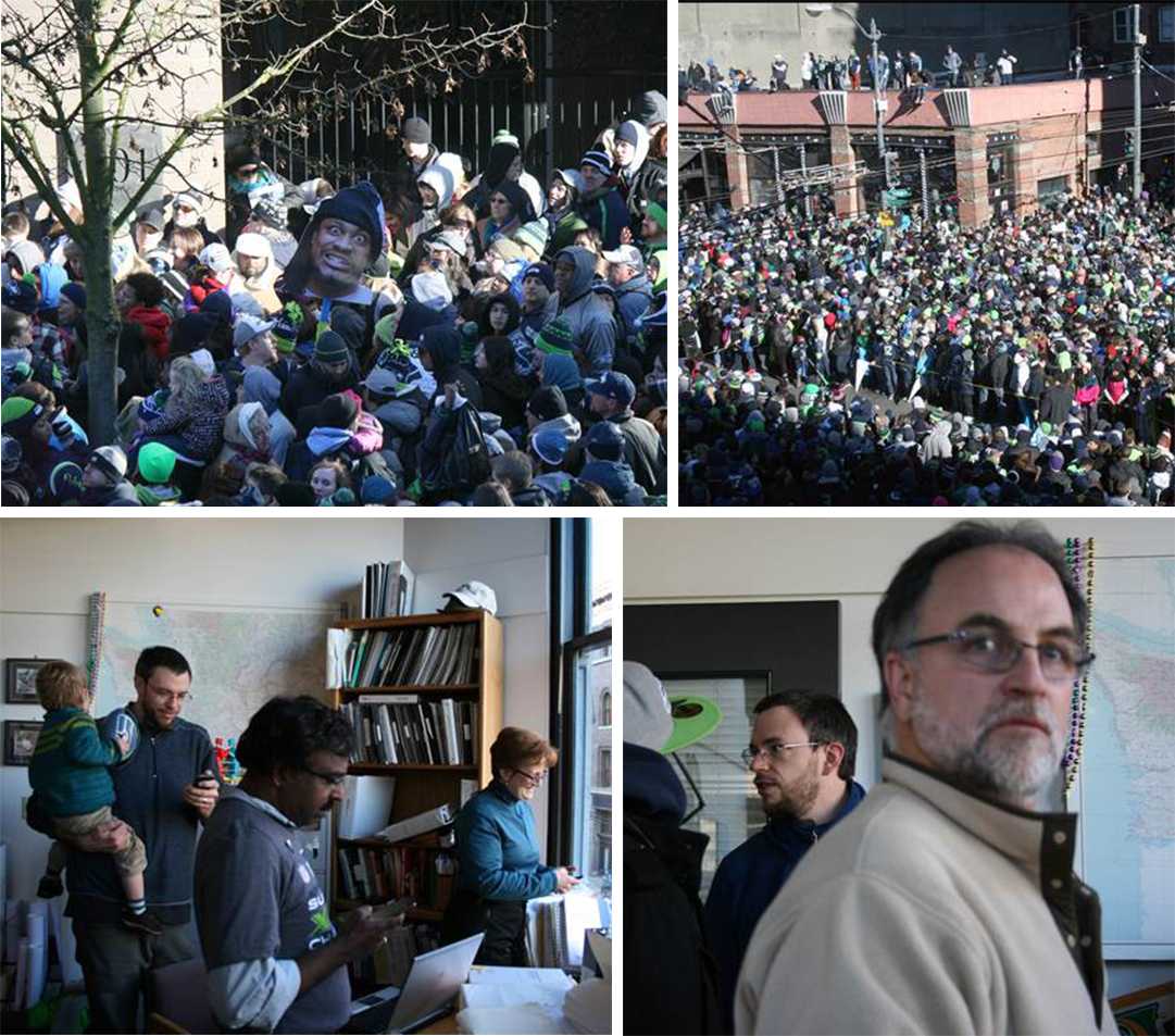 1-2 pm: More waiting . . . still no sign of live Seahawks – or a parade . . . crowd thickens . . . inside watchers get restless waiting . . .
Normal
0
false
false
false
EN-US
X-NONE
X-NONE
/* Style Definitions */
table.MsoNormalTable
{mso-style-name:"Table Normal";
mso-tstyle-rowband-size:0;
mso-tstyle-colband-size:0;
mso-style-noshow:yes;
mso-style-priority:99;
mso-style-parent:"";
mso-padding-alt:0in 5.4pt 0in 5.4pt;
mso-para-margin:0in;
mso-para-margin-bottom:.0001pt;
mso-pagination:widow-orphan;
font-size:10.0pt;
font-family:"Times New Roman","serif";}