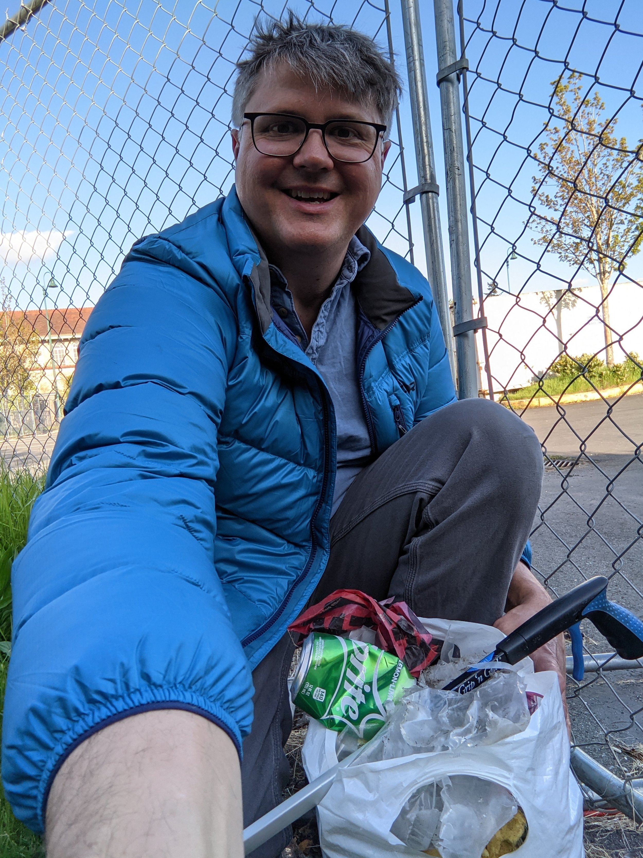 ACT's Owen Reese helping clean-up his son's school's parking lot 