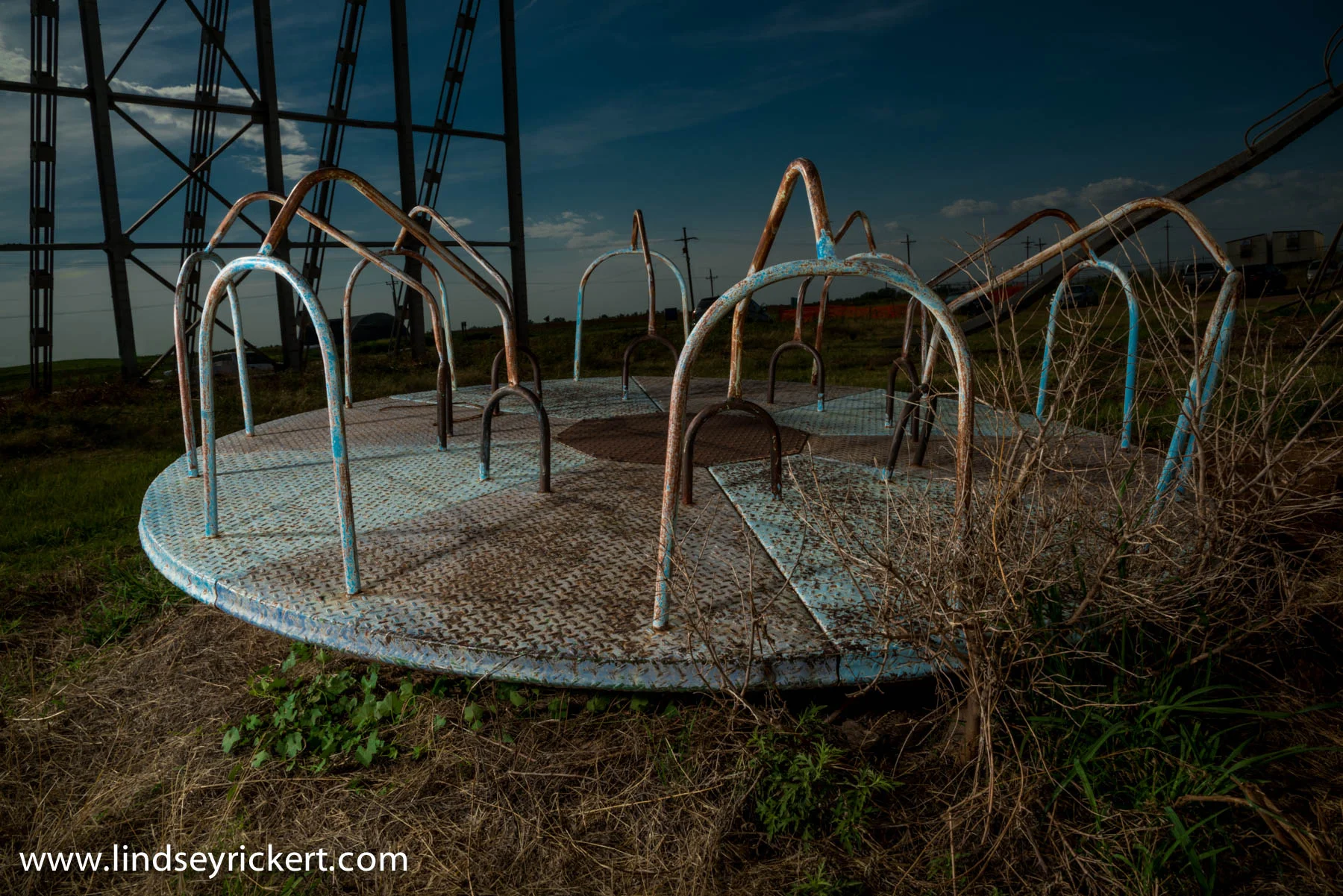 Abandoned playground equipment at abandoned Star-Vu Drive-In located in Anthony, Kansas