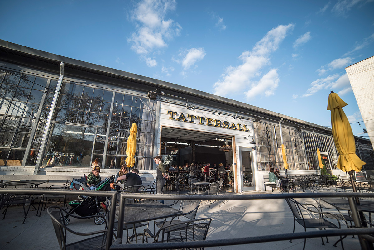 Outside on the patio of Tattersall Distilling. (Photo Credits: Producer: Sam Kovar. Photographer: Tom Okins.)