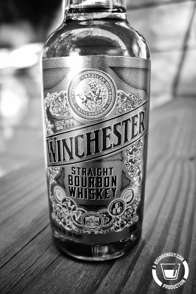 Winchester Straight Bourbon Whiskey in a 50 mL bottle