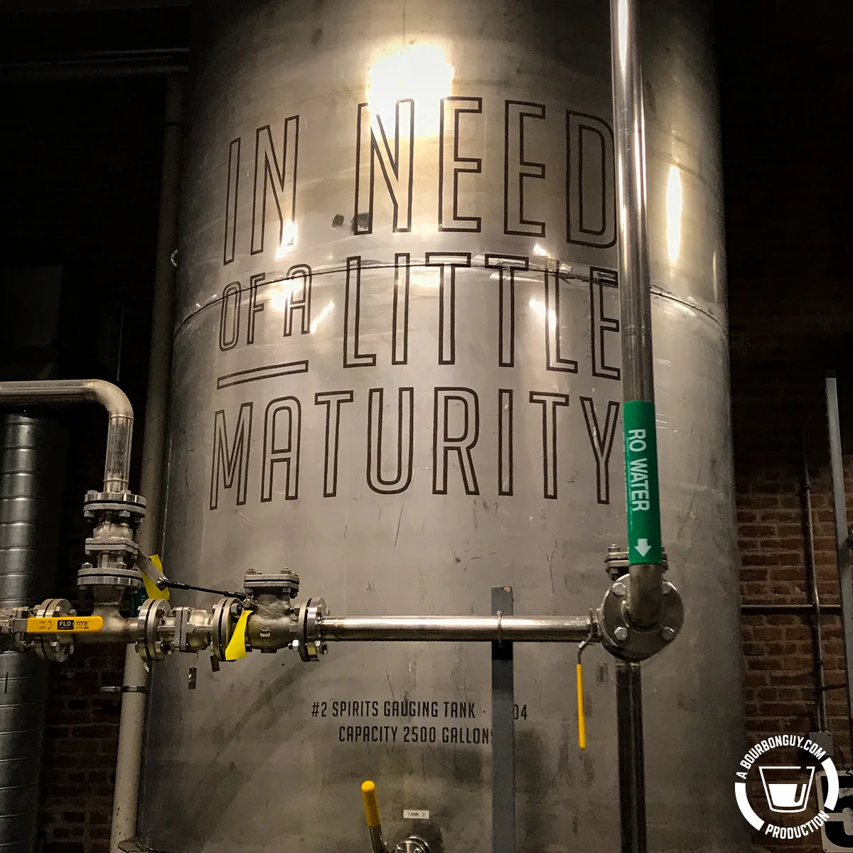 IMAGE: Angel’s Envy New Make holding tank. The tank has the words “In need of a little maturity” stenciled on it.