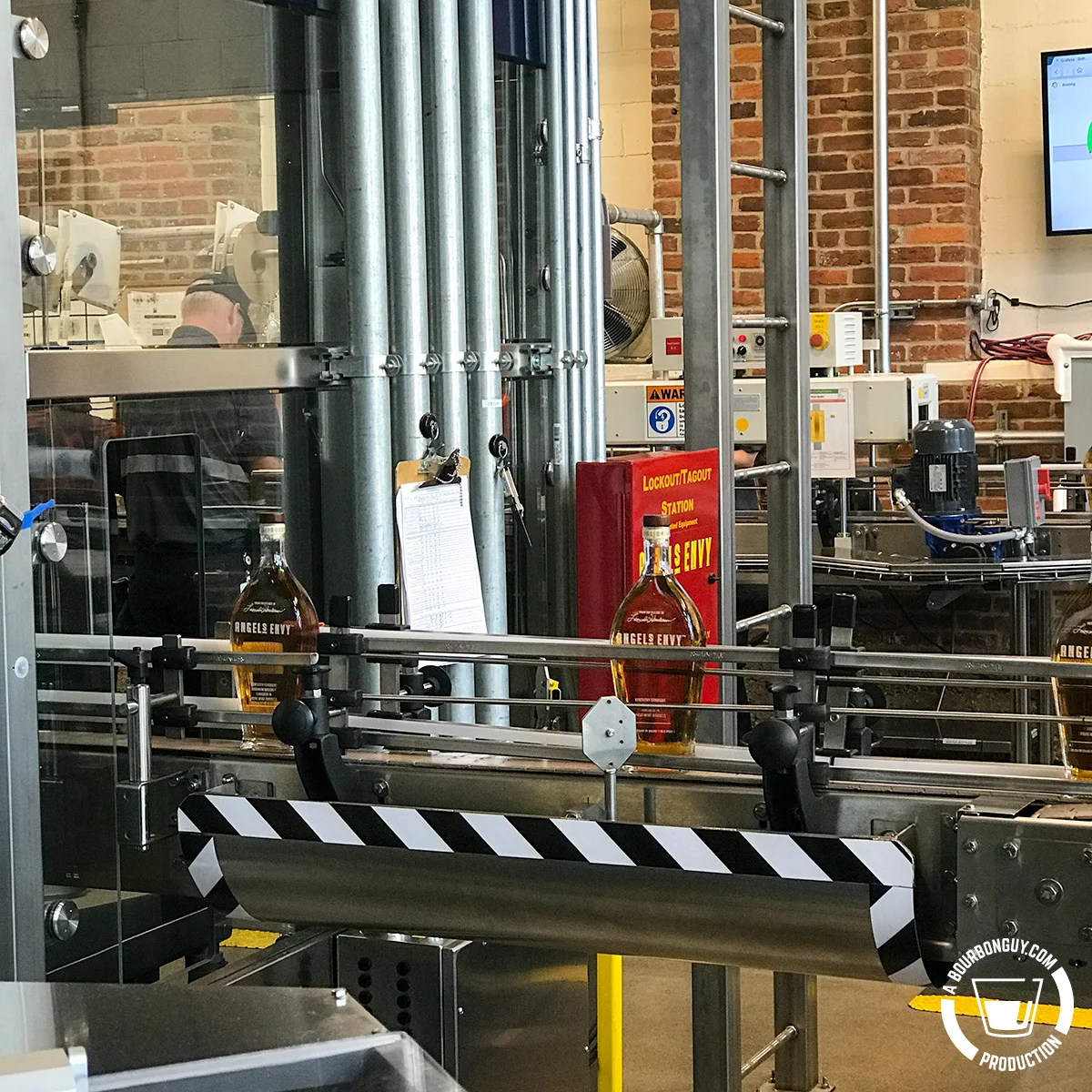 IMAGE: Bottles of Angel’s Envy moving through the bottling line