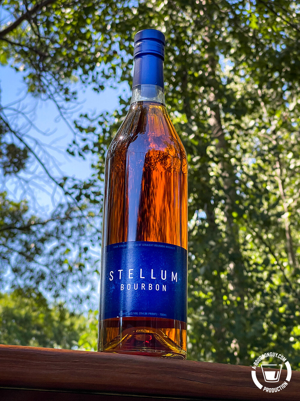 IMAGE: An unopened bottle of Stellum Bourbon sitting in the sunshine.